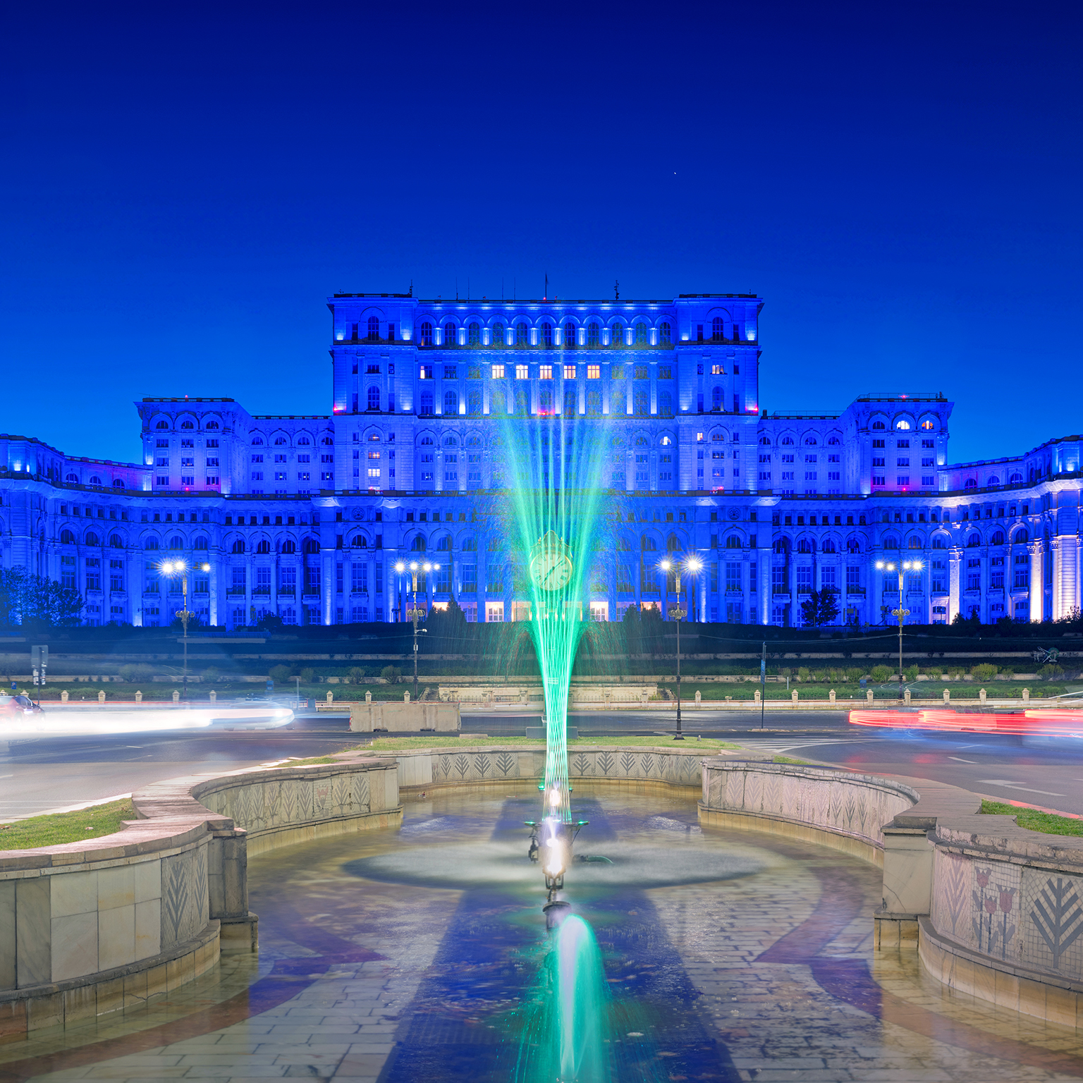 Sunset at the Palace of the Parliament in Bucharest, Romania bathed in blue light