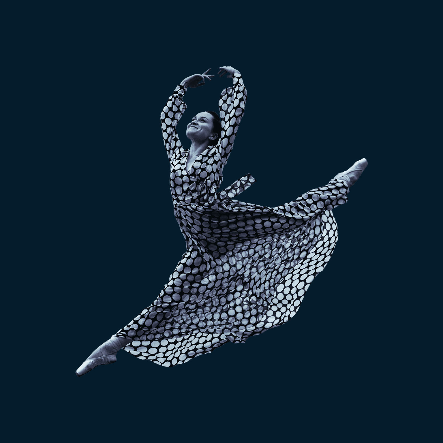 Dancing woman in dress in mid-air jump