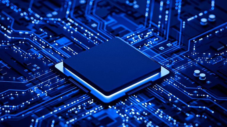 A close-up, futuristic rendering of a microchip at the center of an illuminated circuit board. Glowing blue lines radiate outward like intricate pathways, highlighting the flow of data and electronic connectivity.