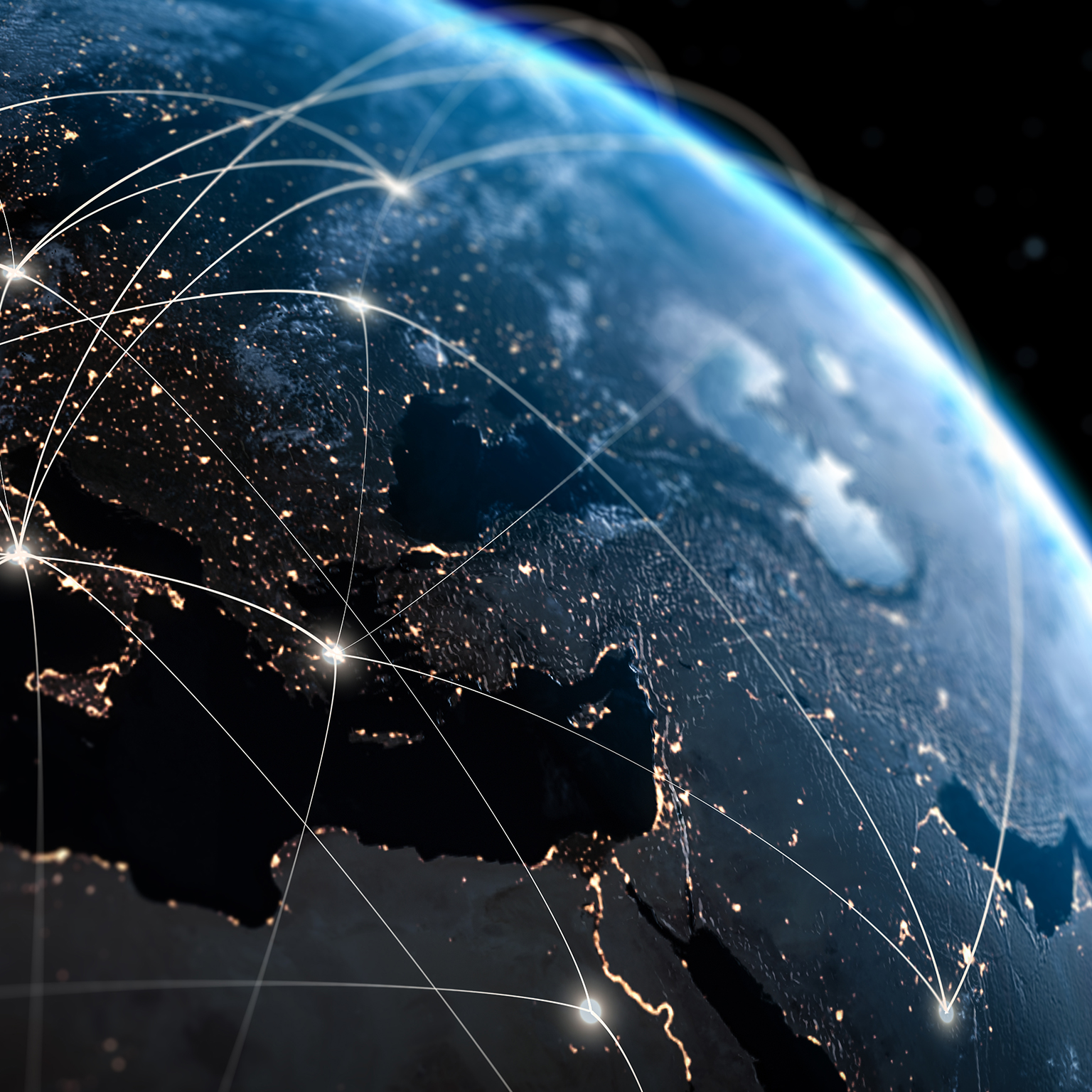 View of Earth from space with glowing lines of interconnectivity across globe.