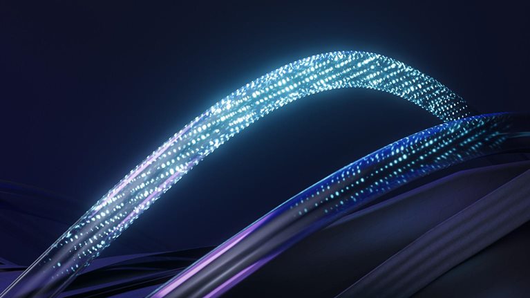 This image appears to be an abstract digital graphic depicting glowing, interconnected lines or light paths against a dark background. The graphic likely represents data transfer, networking, or fiber optic technology.