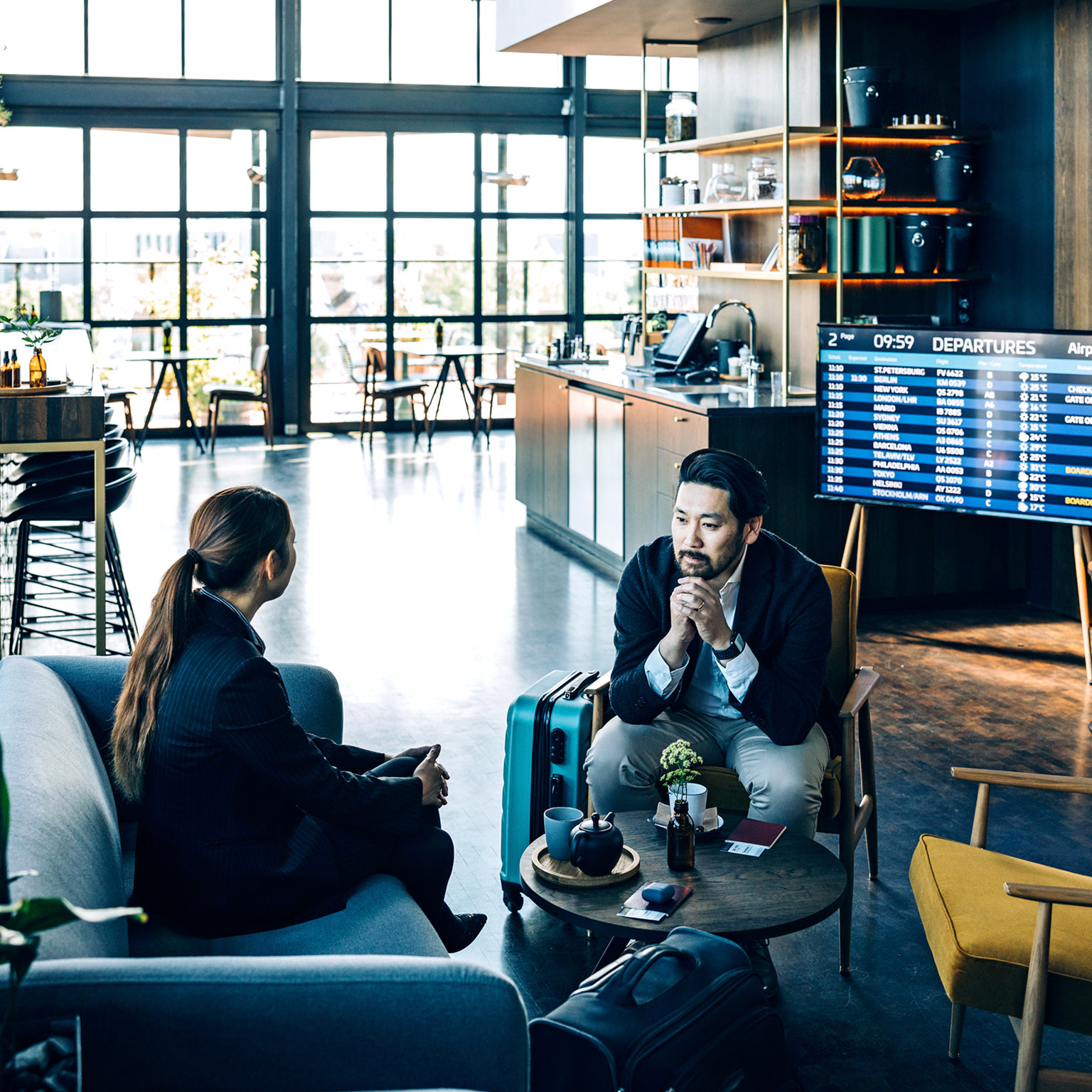 Businesspeople waiting for their flight at the airport business lounge