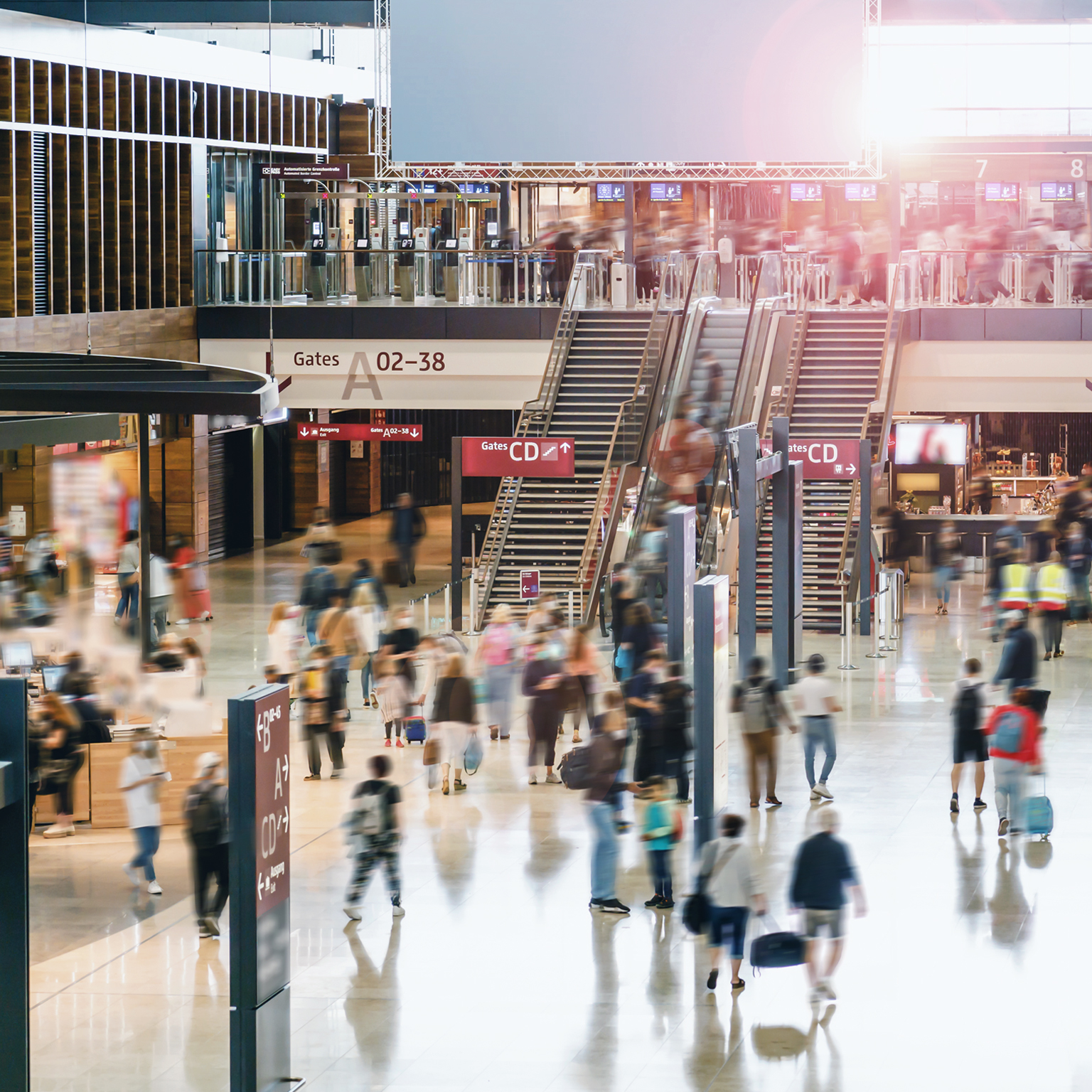 Airport hall with travelers