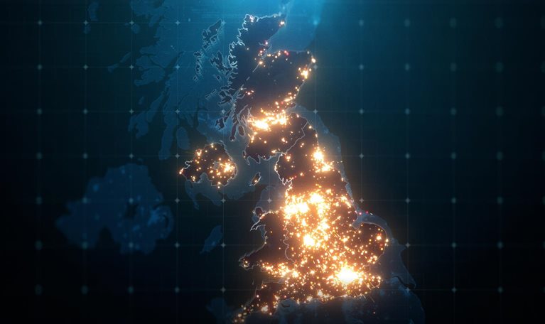 Night map of United Kingdom with city lights illuminated