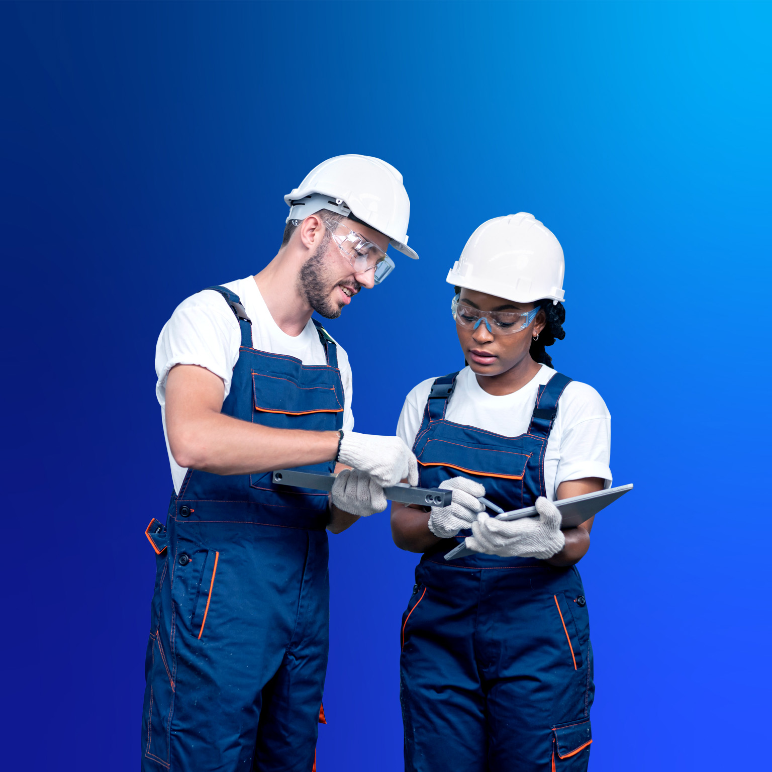 Two production operators with tablet in factory shop floor