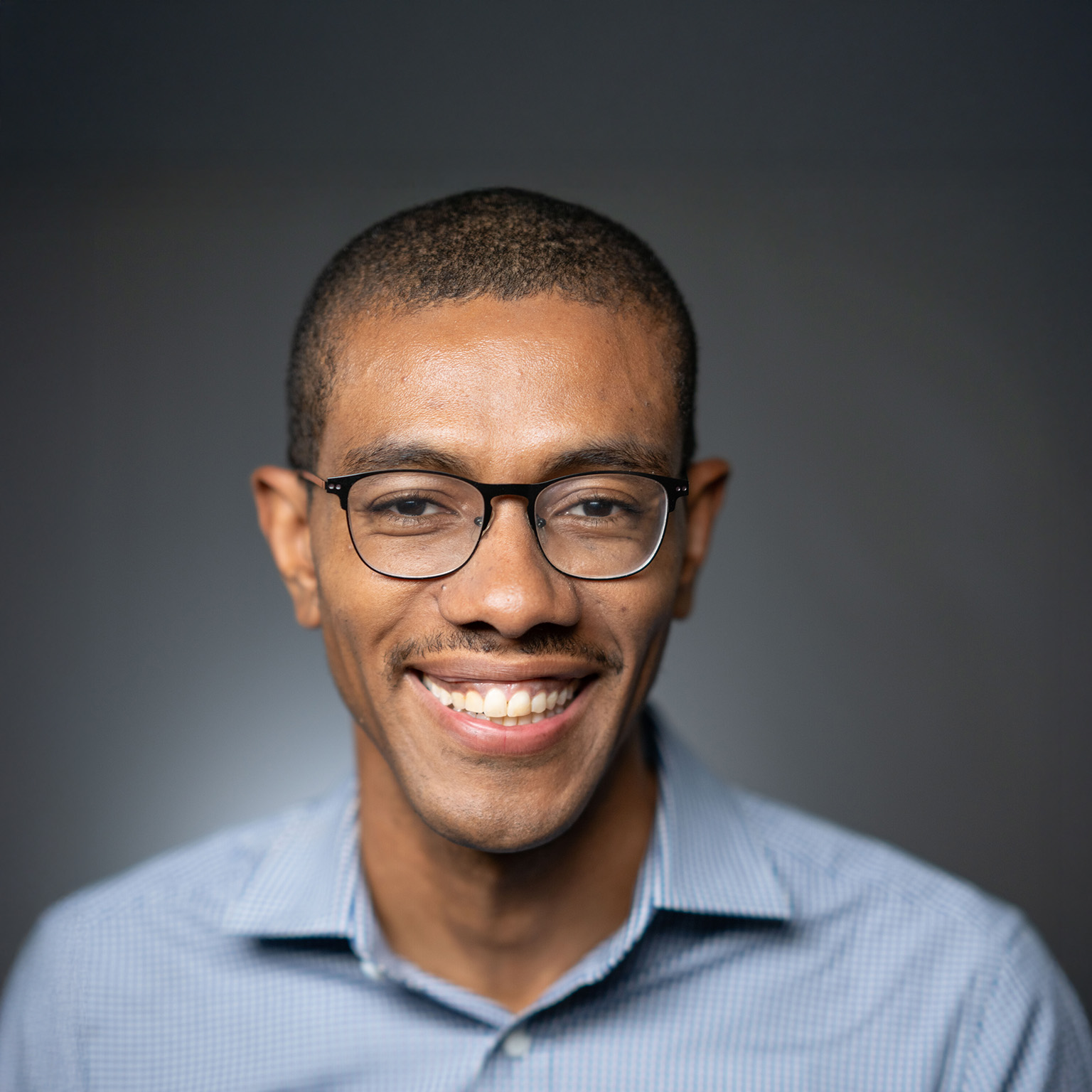 Smiling portrait photo of Philip Reeves, the founding partner of Apis & Heritage Capital Partners